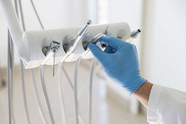 Professional Tooth Extraction technician working in Cuero, TX